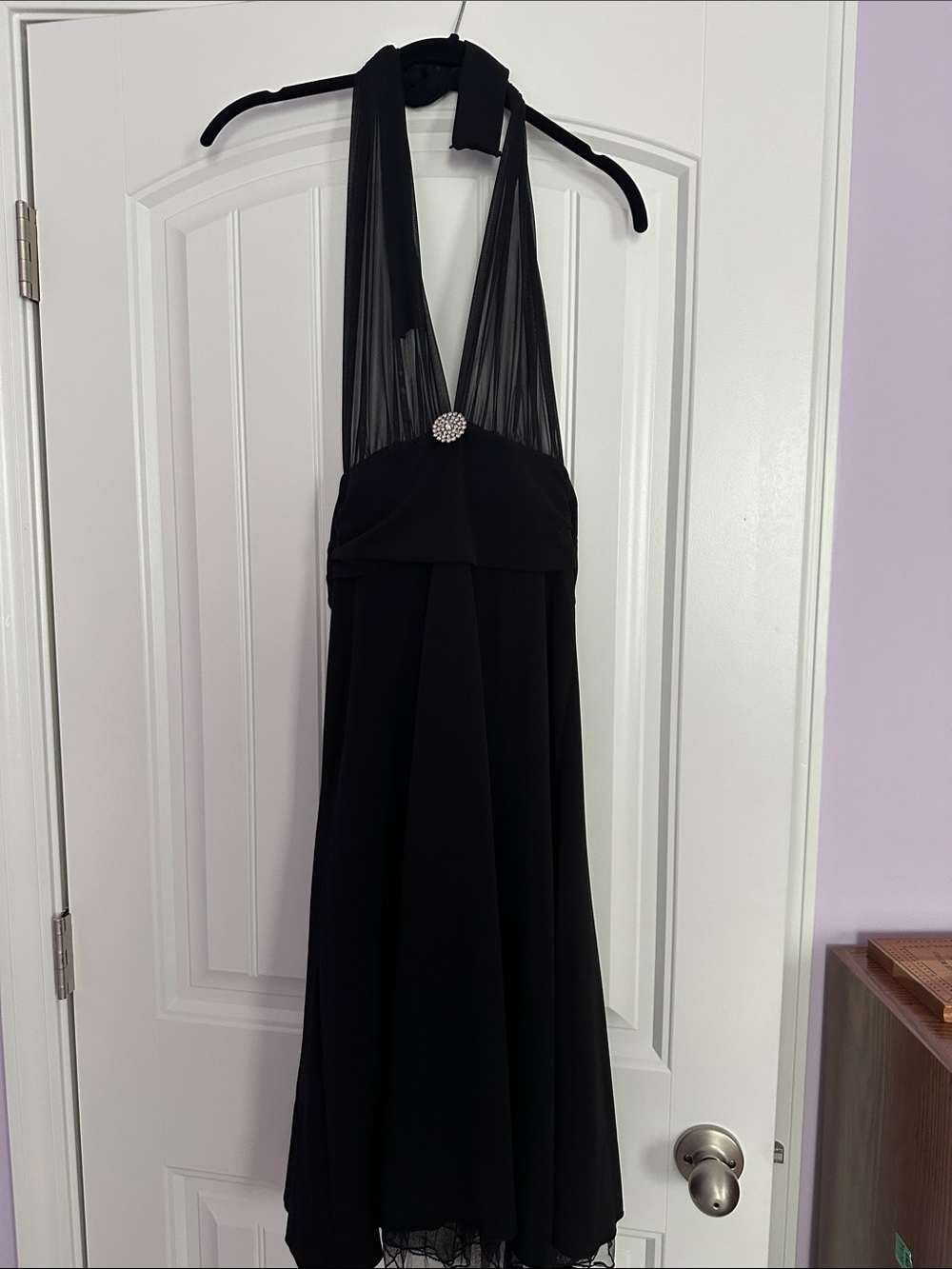 Black Backless Vintage Style Marilyn Dress with Rhinestone Accent.